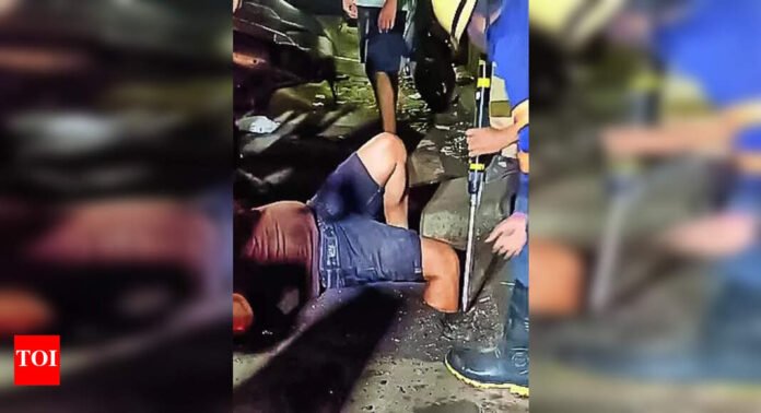 Man's leg stuck in Mum drain hole, freed after over 4 hours | India News - The Times of India